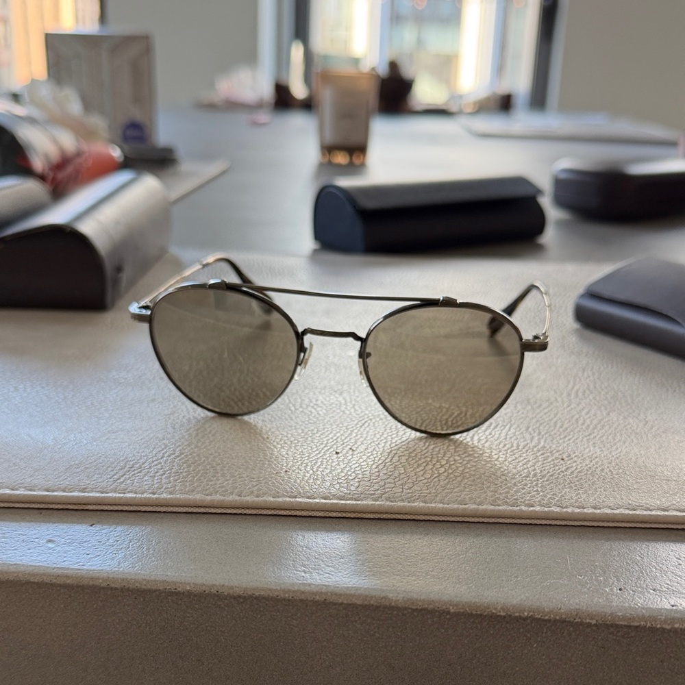 Oliver peoples Stylish gold lens Sunglasses